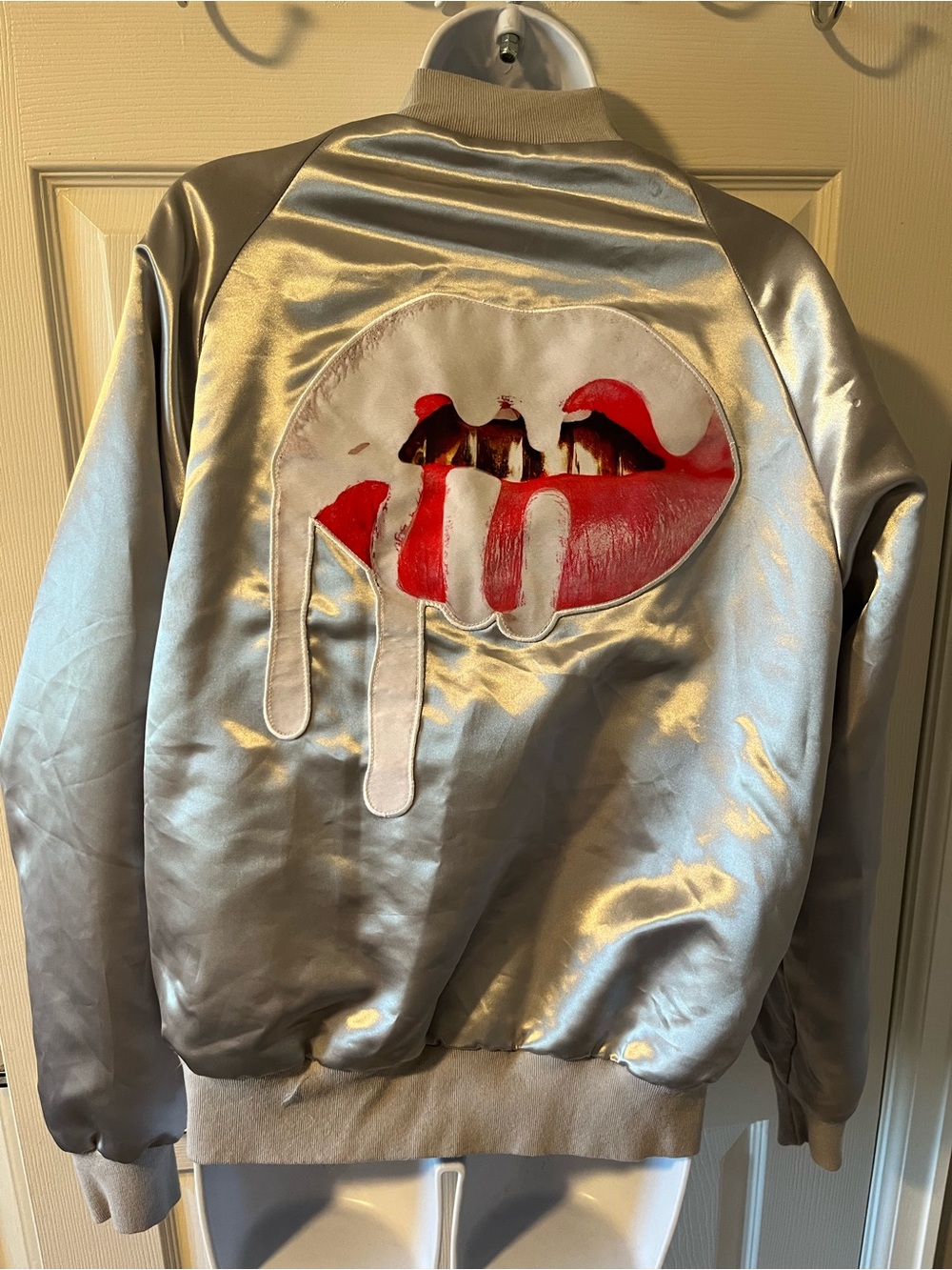 Kylie Silver Satin Bomber Jacket with Red Drip Lips Graphic
